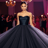 Elegant evening gown showcasing exceptional craftsmanship in high-end fashion at a glamorous event