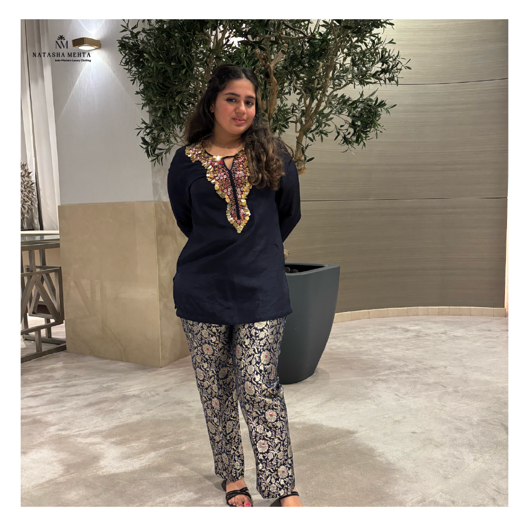 Elegant navy silk tunic with intricate embroidery paired with floral patterned silk pants, perfect for Dubai UAE events