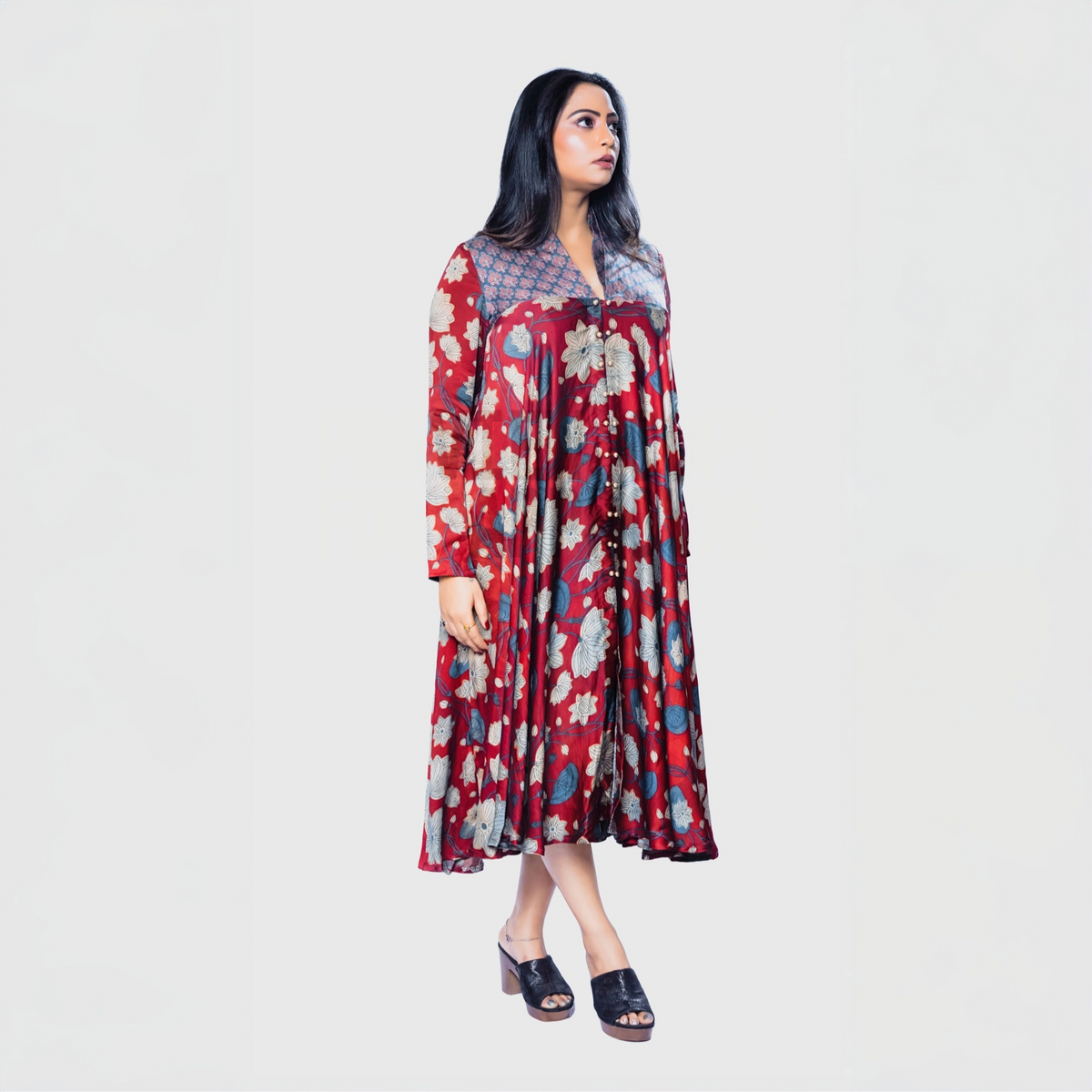 Woman wearing Ajrakh handcrafted midi dress Dubai with floral patterns and buttoned neckline