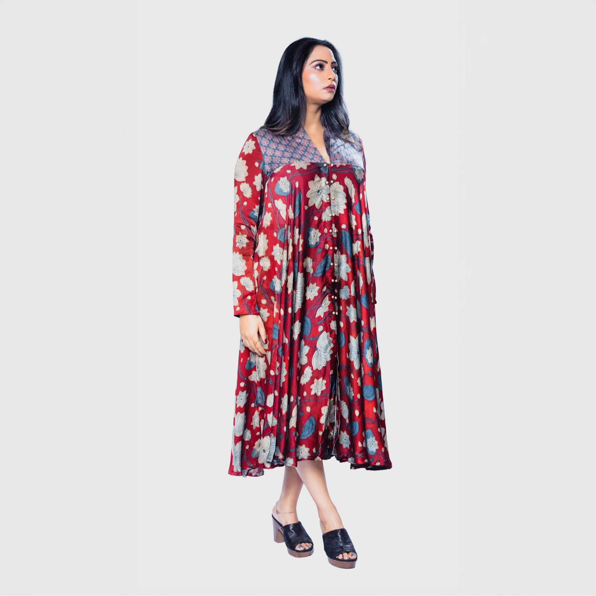 Woman wearing Ajrakh handcrafted midi dress Dubai with floral patterns and buttoned neckline