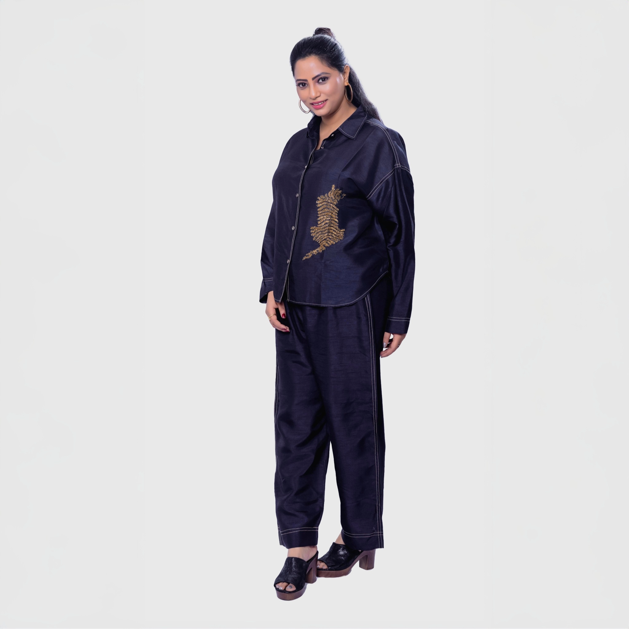 Women wearing black shirt and pants set with gold embroidery handcrafted designer clothing for women by My Store