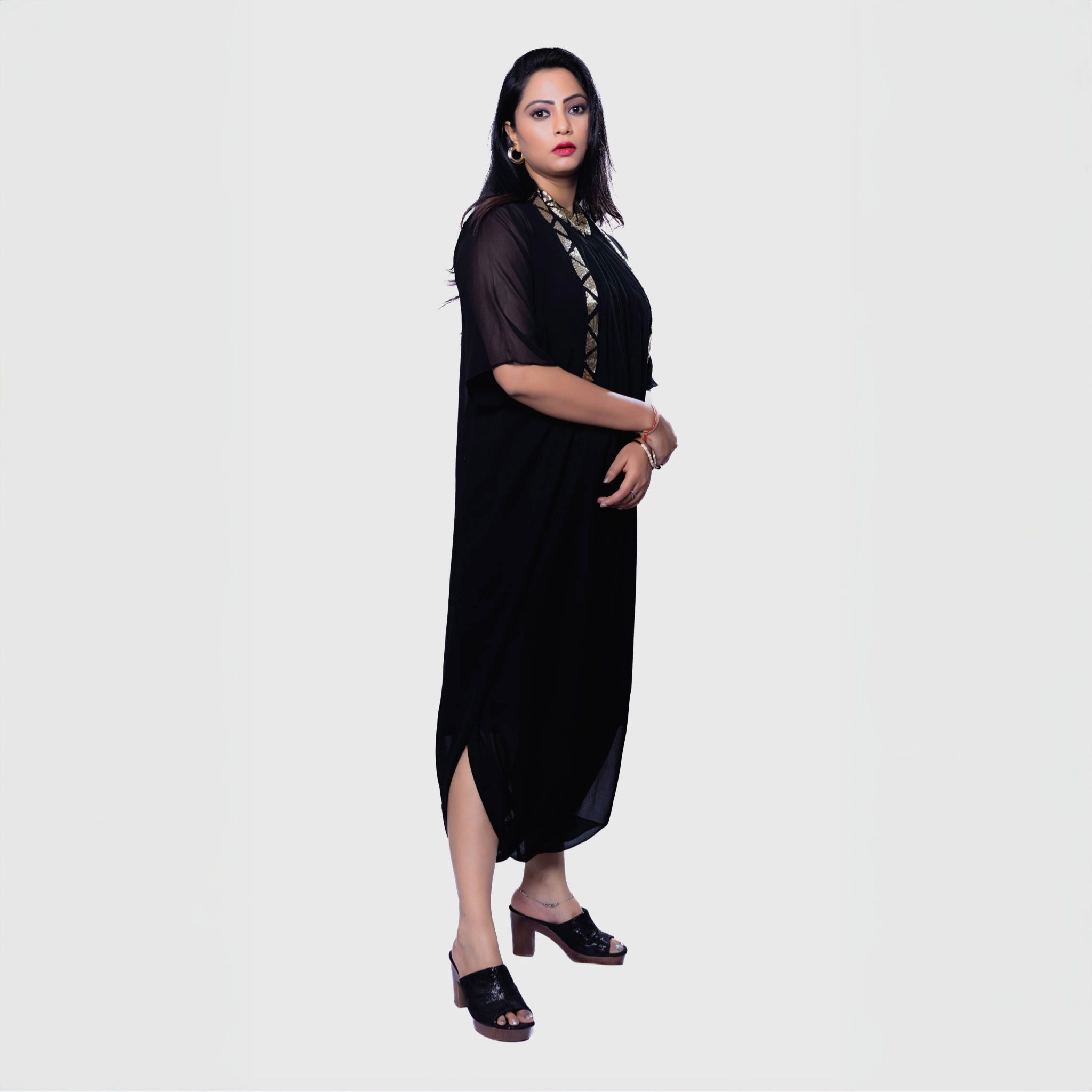 Black cocktail dress with gold embroidery and Jacket long dress styled with sheer sleeves and open toe heels