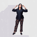 Stylish black collared top and pants set featuring geometric patterns, perfect for Dubai events