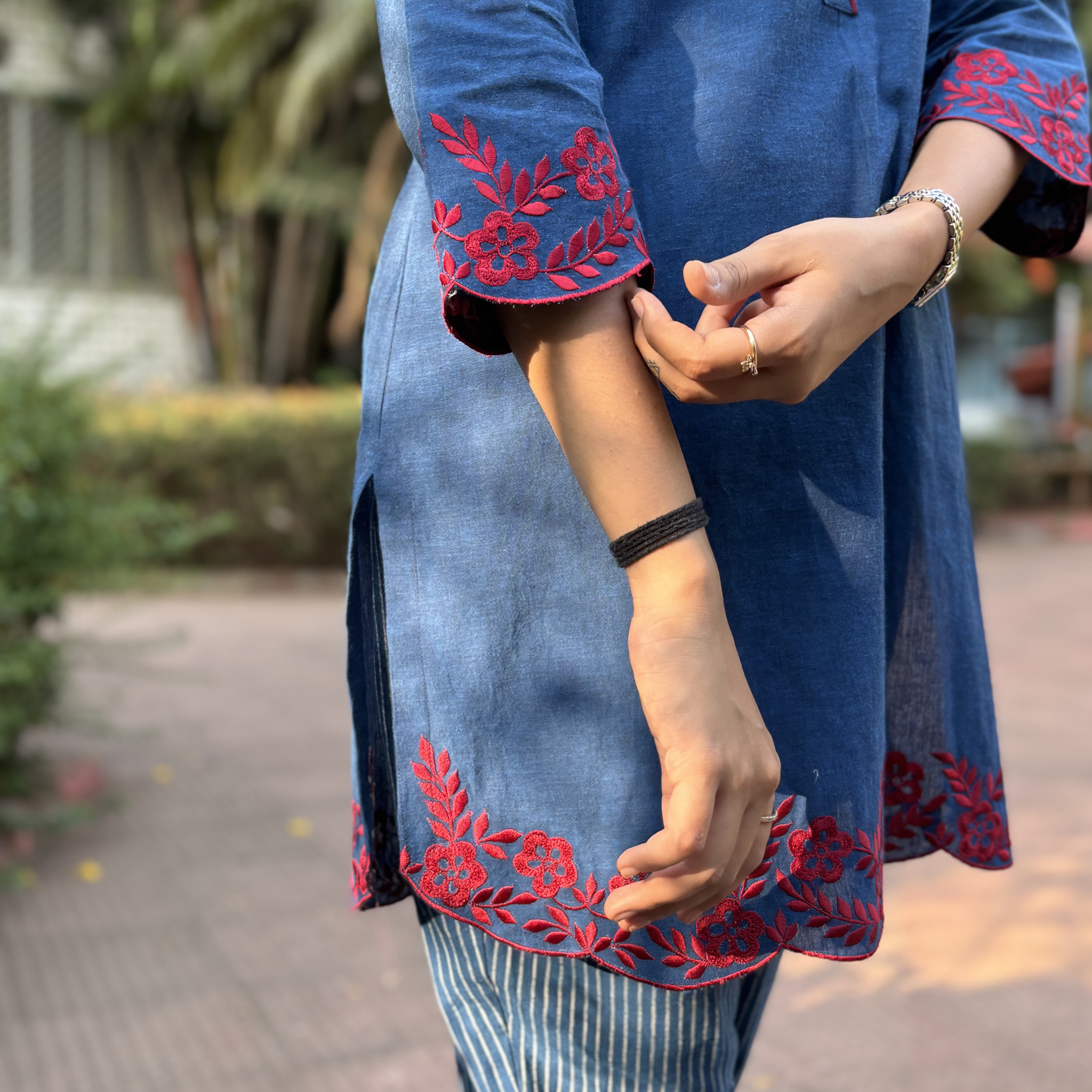 Floral kurta set in blue with red embroidery, perfect for casual outings or Dubai events, featuring a stylish striped pattern.