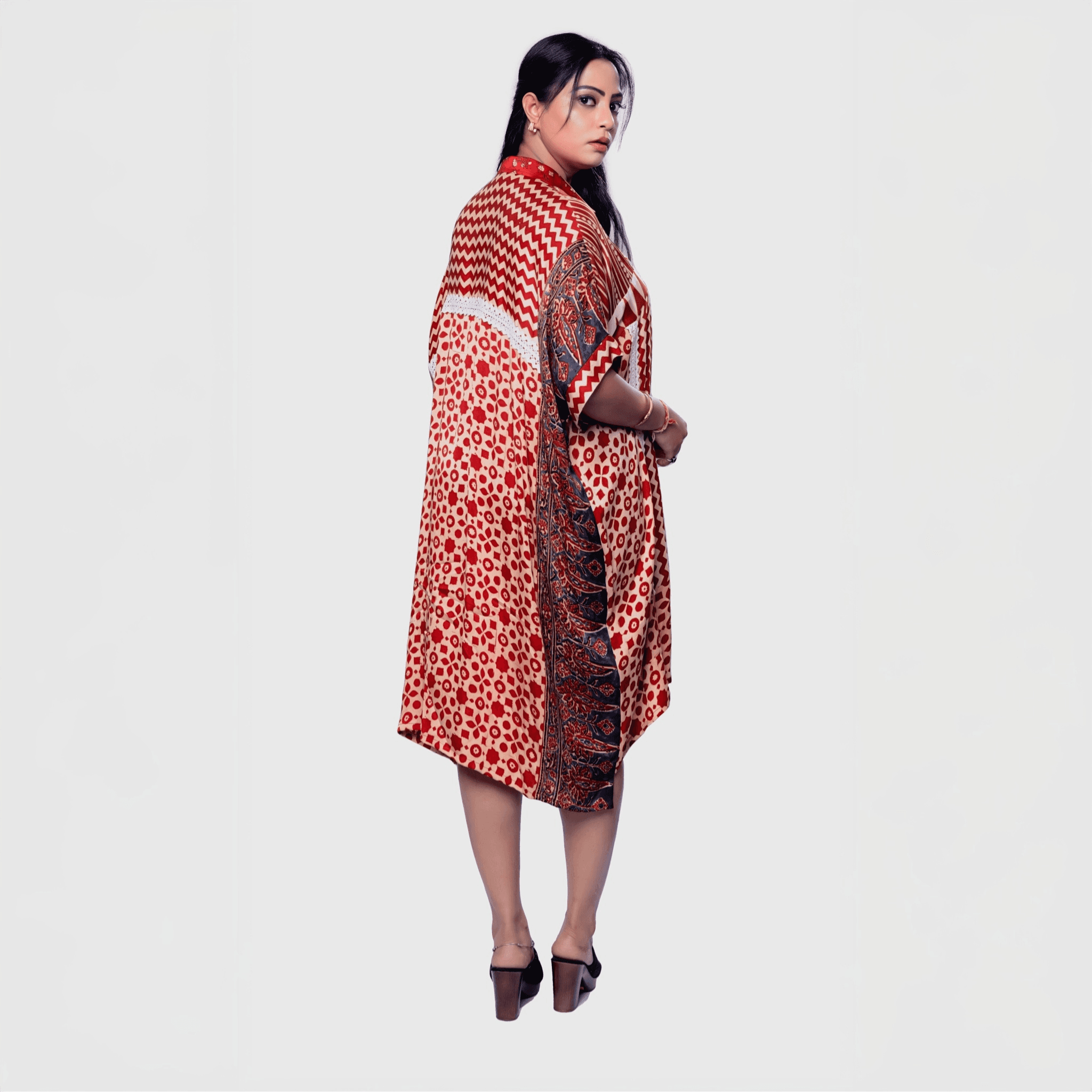 Woman wearing a red and patterned bohemian chic kaftan outfit one pcs dress from My Store