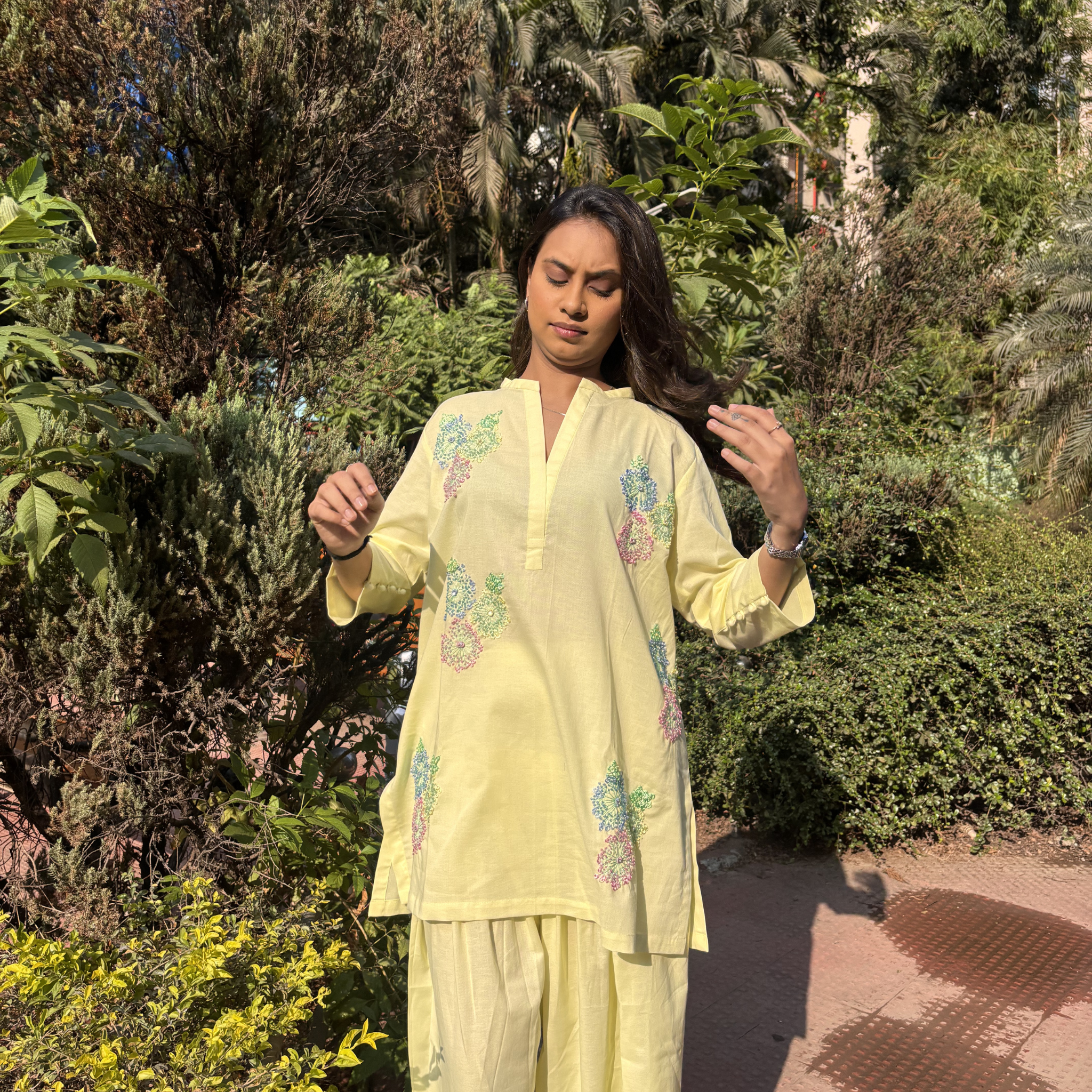 Butter yellow dresses with floral embroidery, perfect for casual outings or Dubai events