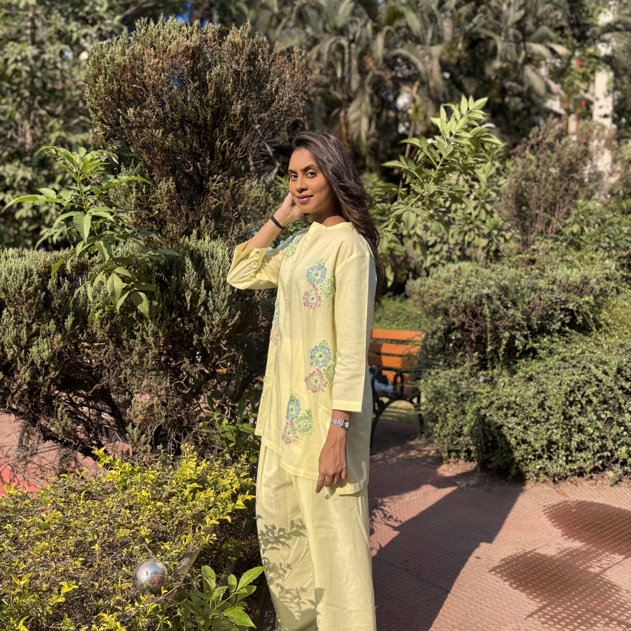 Elegant butter yellow dress set with floral embroidery, perfect for casual outings or Dubai events