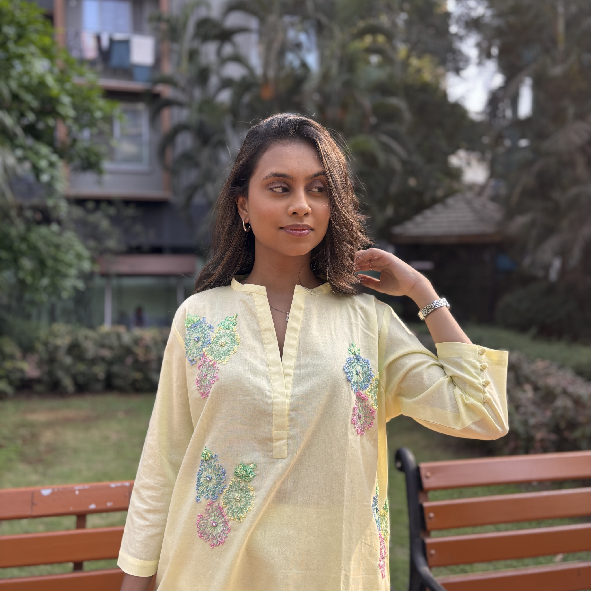 Butter yellow dresses featuring floral embroidery and a relaxed fit, perfect for casual outings in Dubai