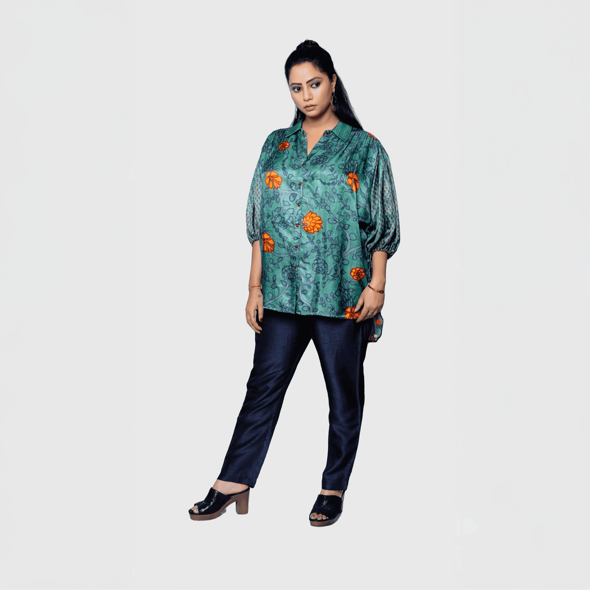 Stylish designer collared kurta for women in green with floral patterns and puff sleeves