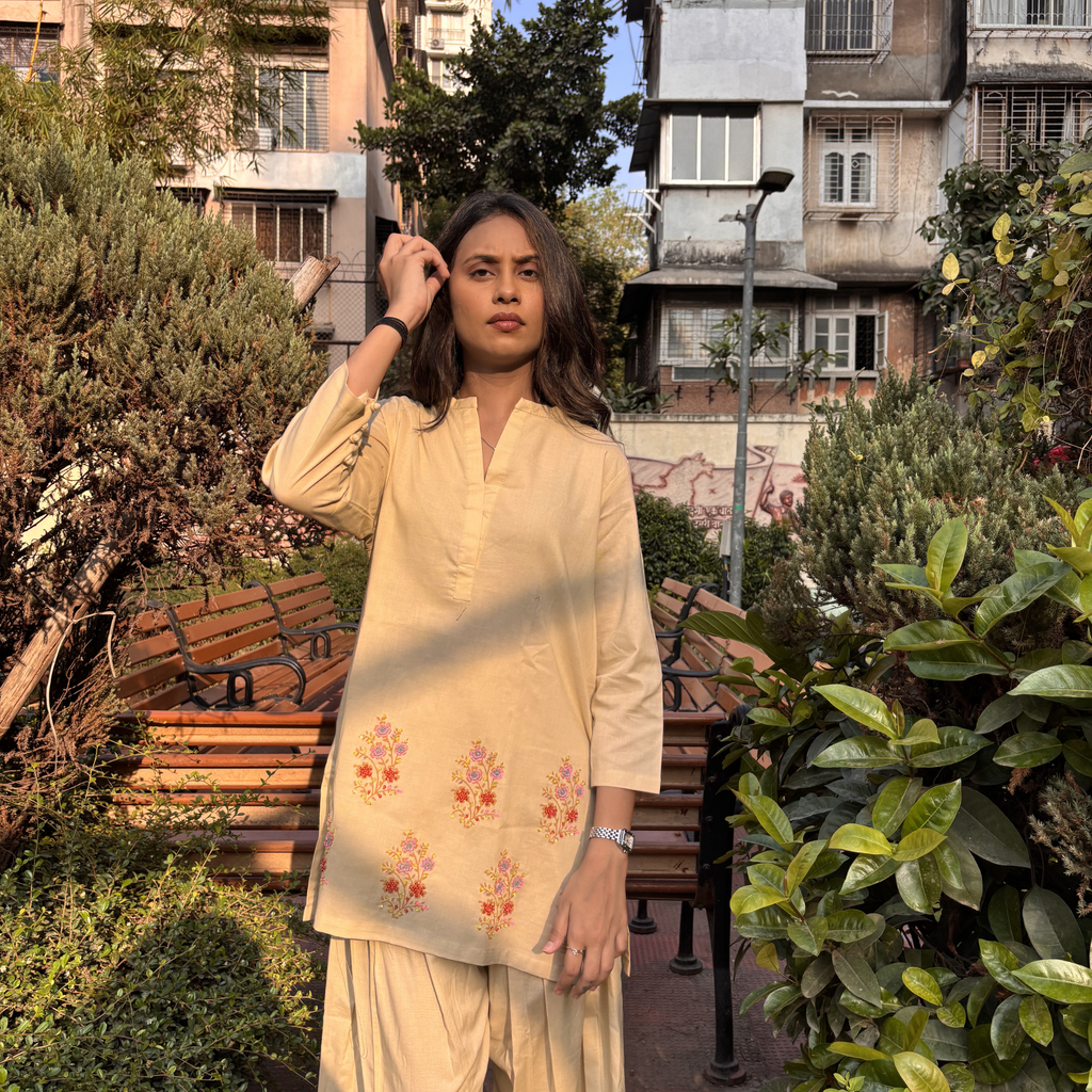 Embroidered pajamas set by Natasha Mehta in soft yellow with floral patterns, ideal for casual outings or home wear