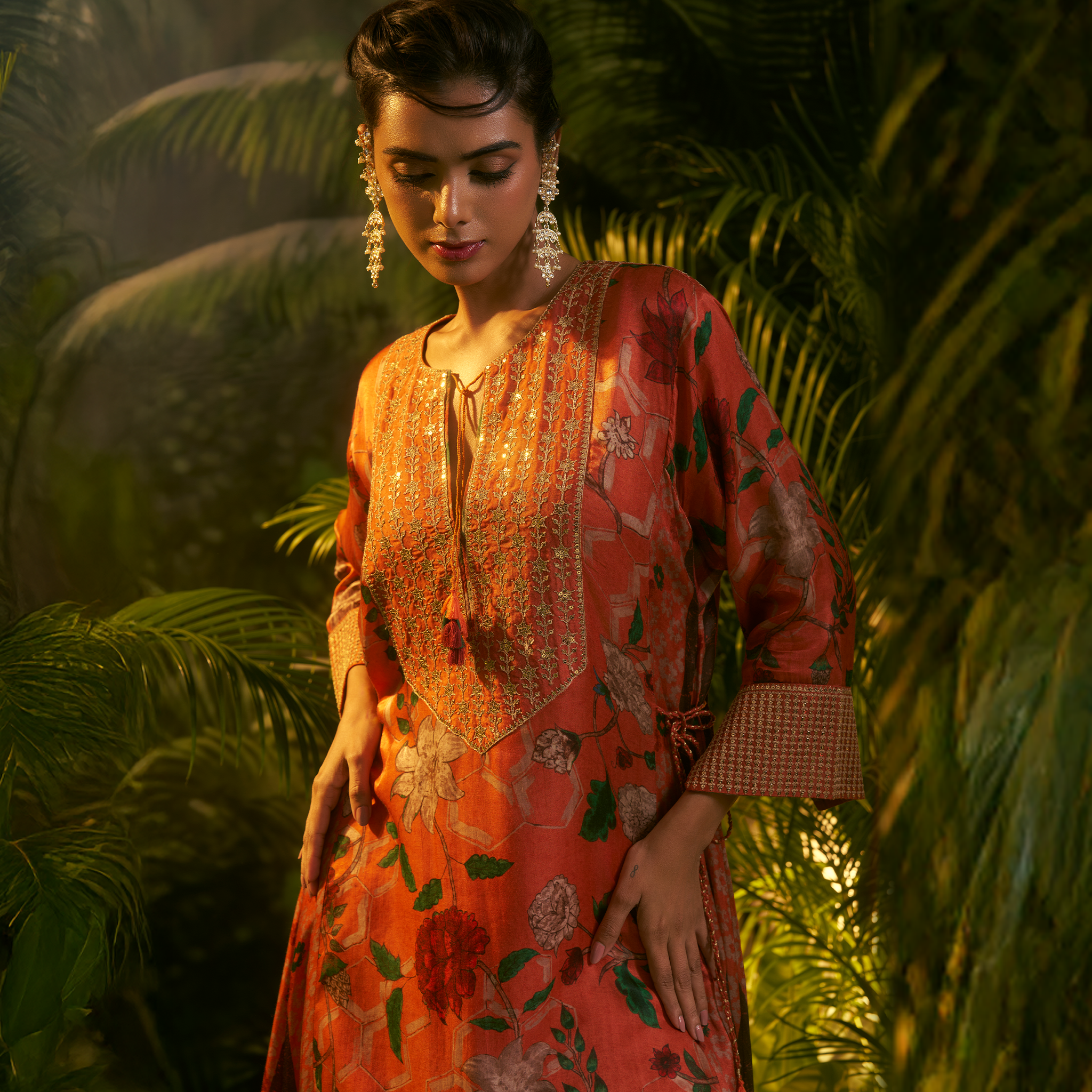 Natasha Mehta luxury silk kurta in orange floral design for special occasions with intricate detailing