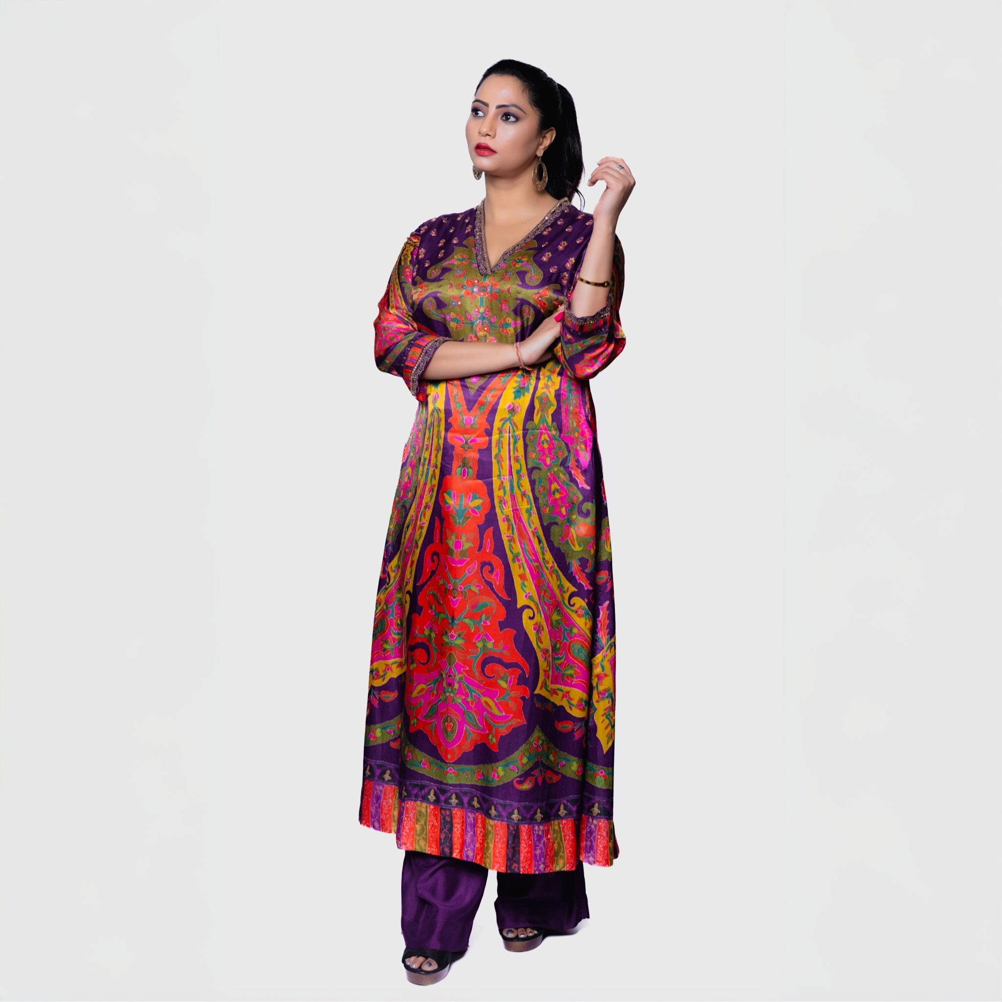 Colorful fusion kurta pant set featuring vibrant patterns and elegant design for festive occasions