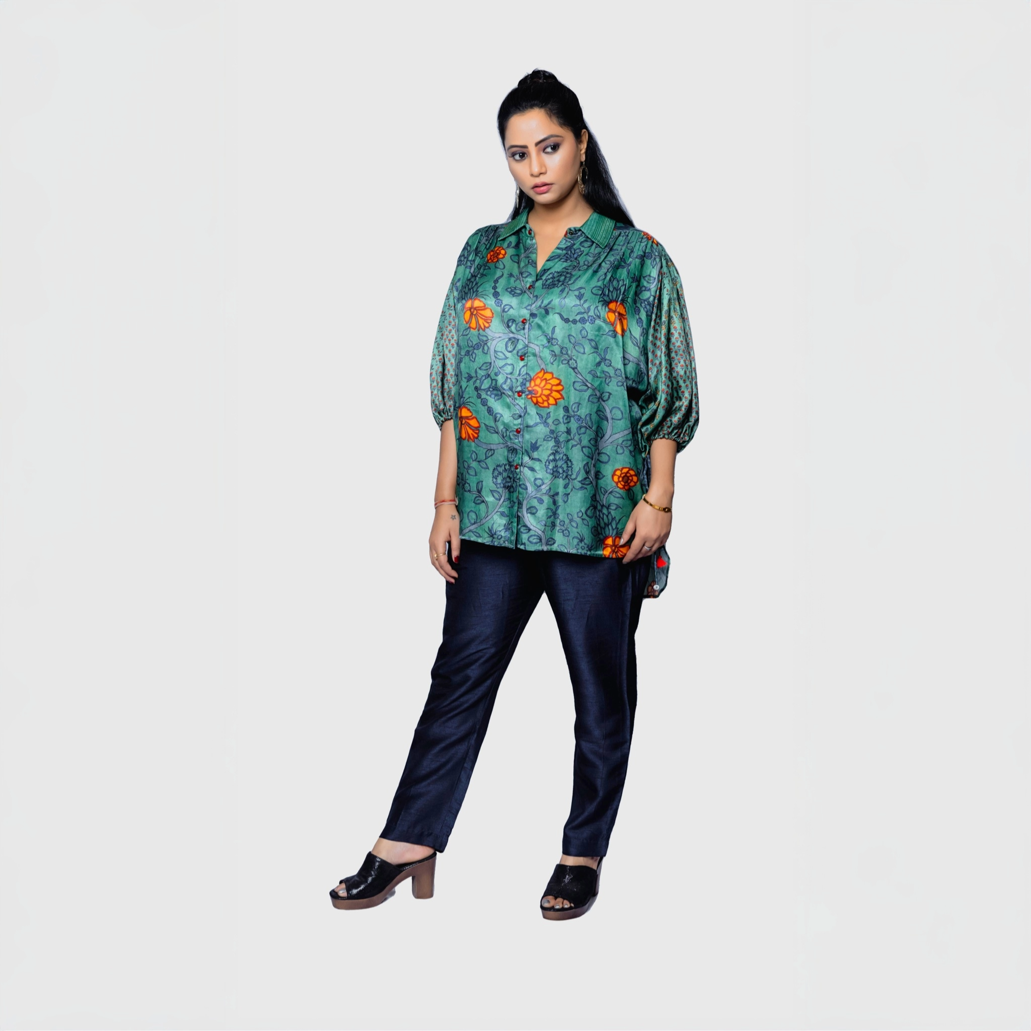 Designer collared kurta for women in green with orange floral print and black pants