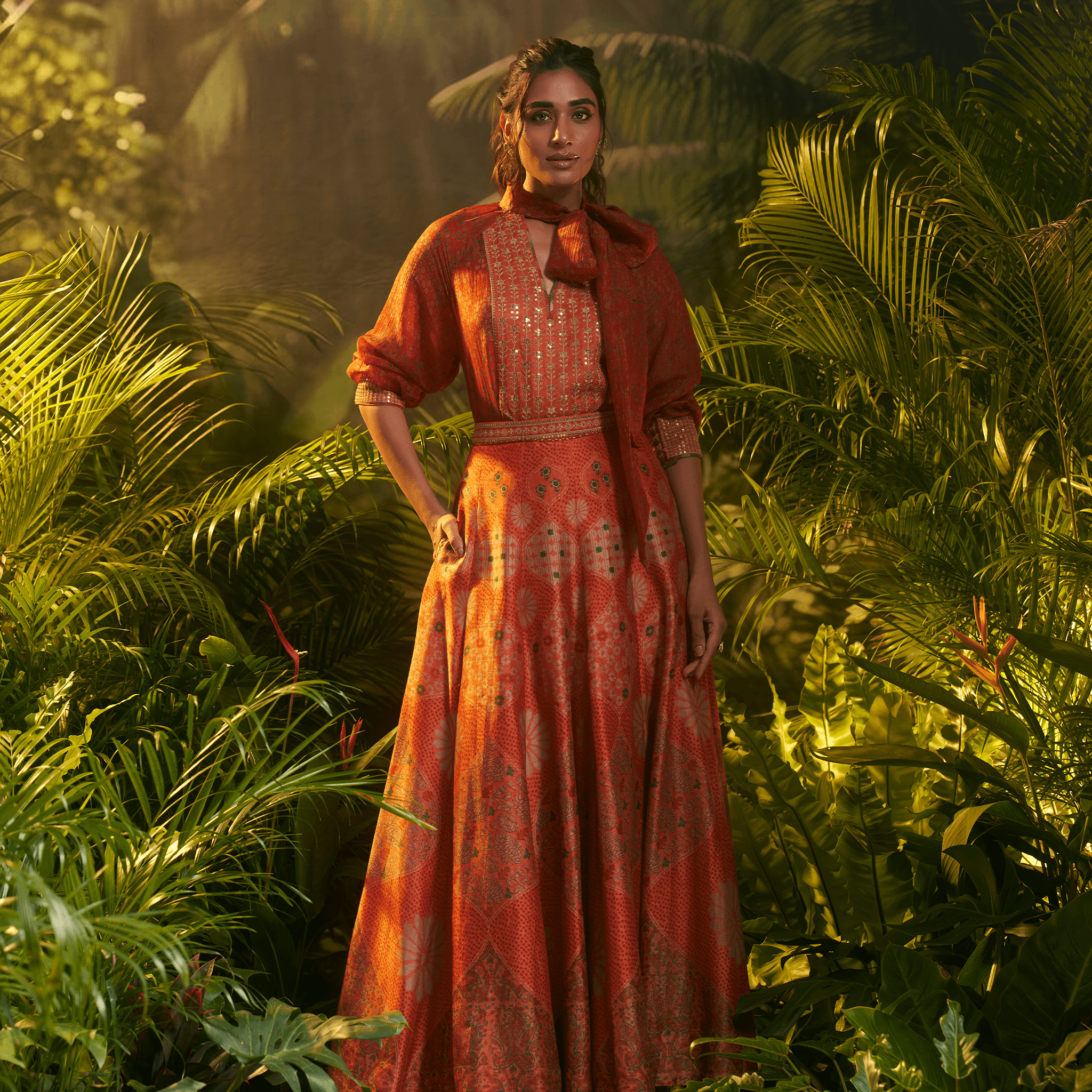 Elegant designer Indian fusion wear Dubai featuring a vibrant dress with intricate patterns and matching shawl