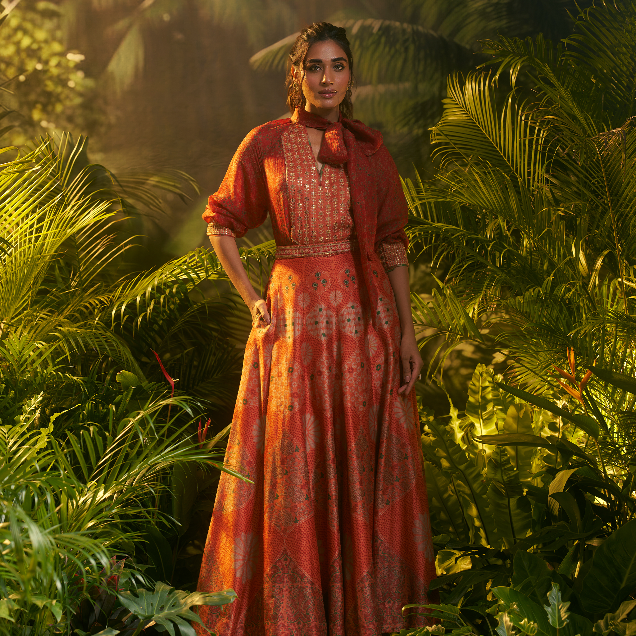 Elegant designer Indian fusion wear Dubai featuring a vibrant dress with intricate patterns and matching shawl