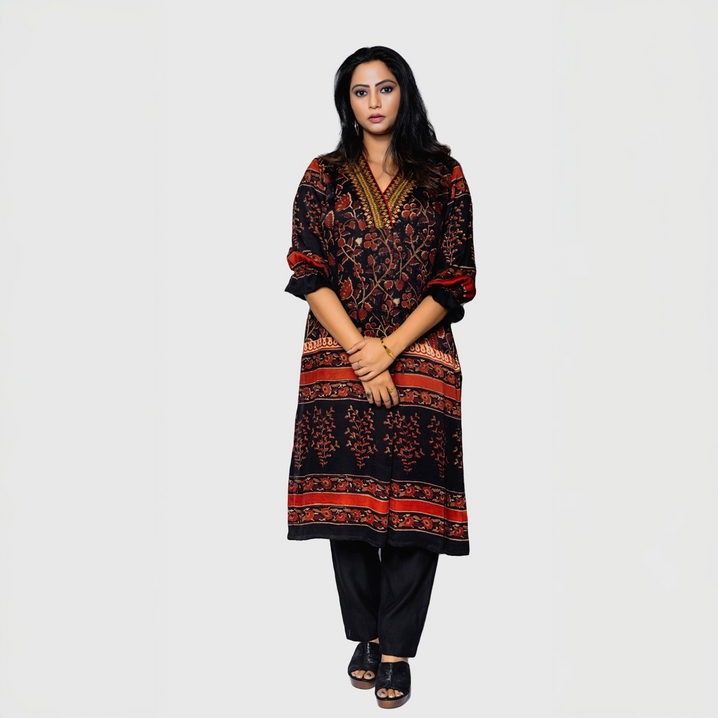 Elegant designer rust kurta for women with intricate floral patterns and black pants