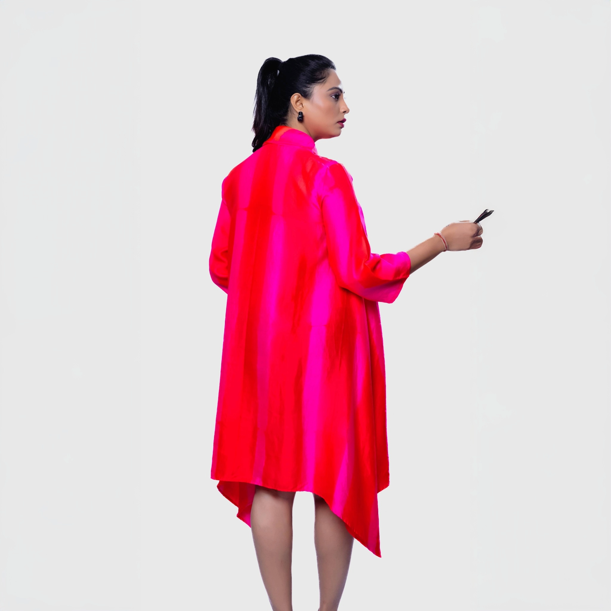 Elegant Fushia pink flare dress online featuring a stylish high-low hem and three-quarter sleeves