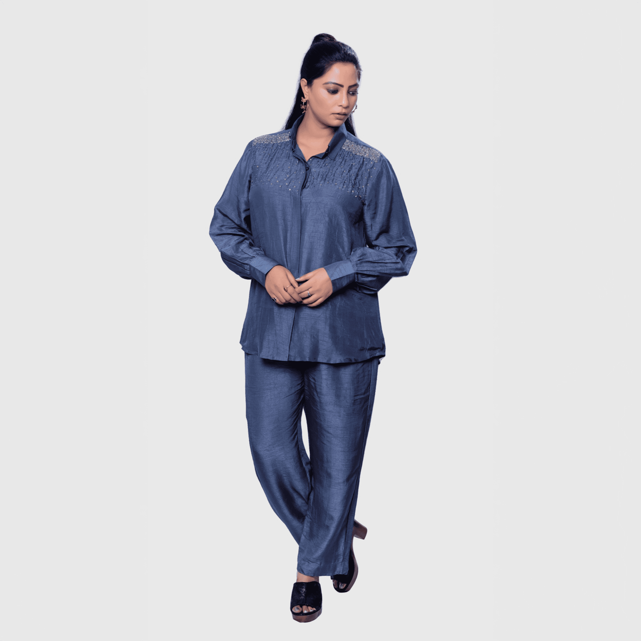 Luxury two-piece party set in blue featuring a stylish shirt and matching pants for elegant occasions