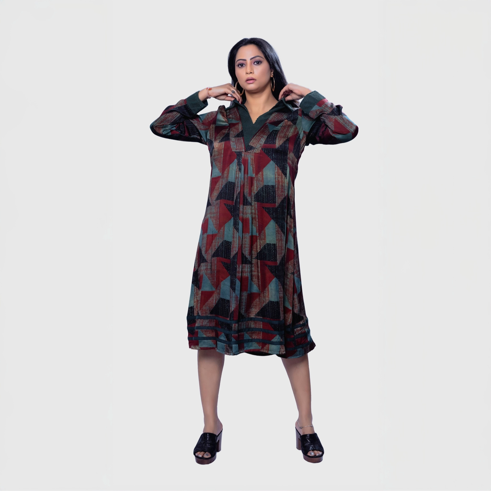 Model wearing a luxury women's dress Dubai with geometric patterns and long sleeves from My Store