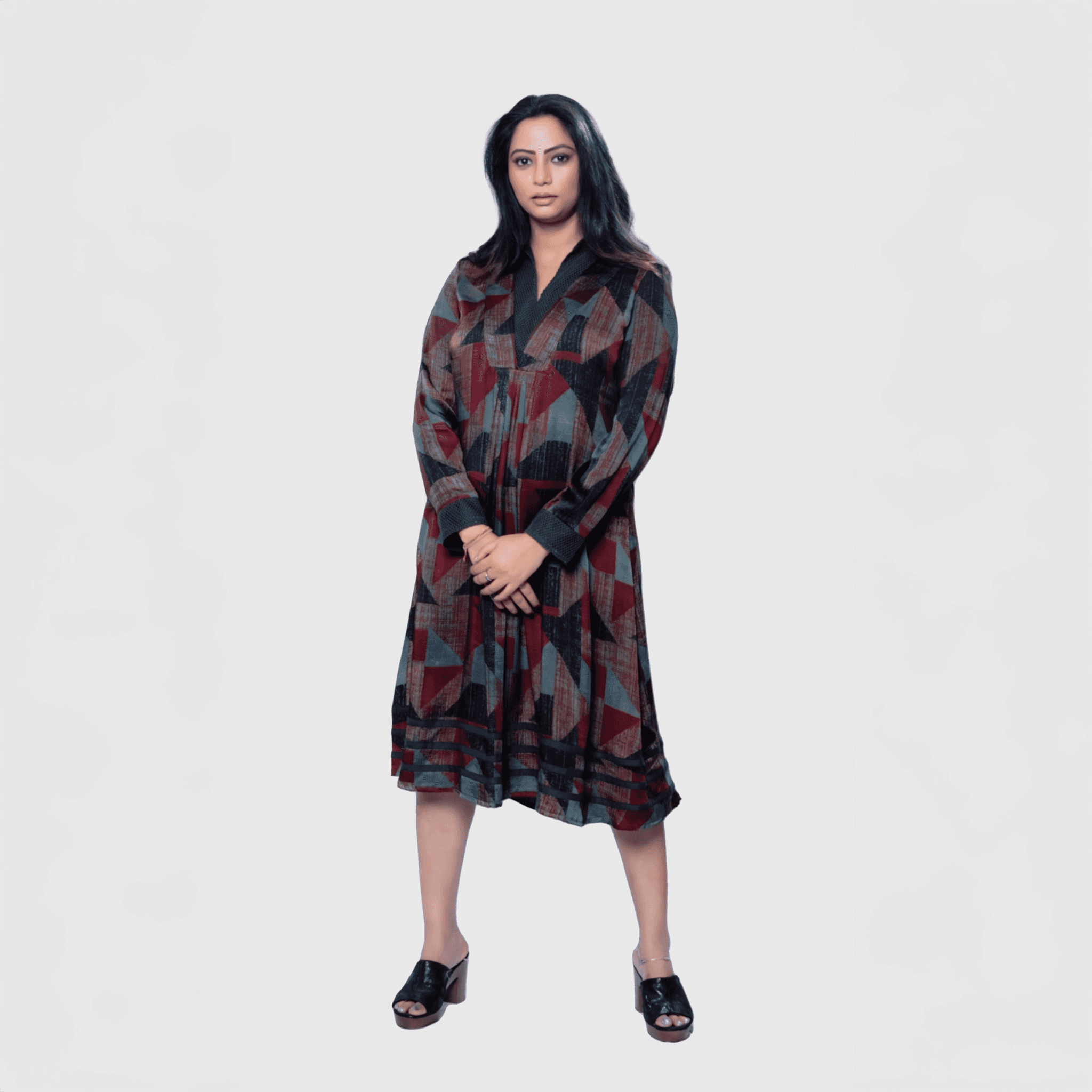 Luxury women's dress Dubai featuring a geometric pattern with a flattering silhouette