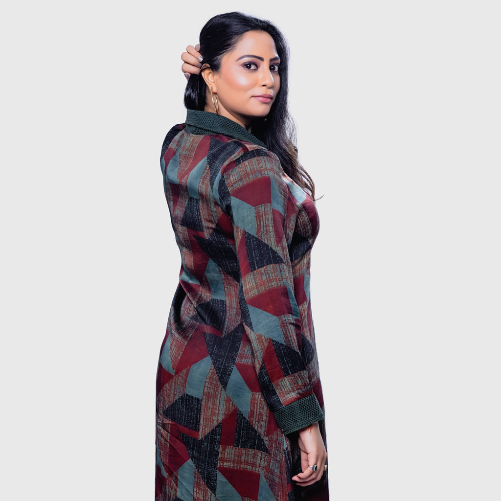 Elegant luxury women's dress Dubai featuring a stylish geometric design and long sleeves