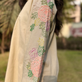 Beige embroidered tunic with floral pattern and pastel colors, perfect for a casual outing or Dubai occasion, part of a matching set women's.