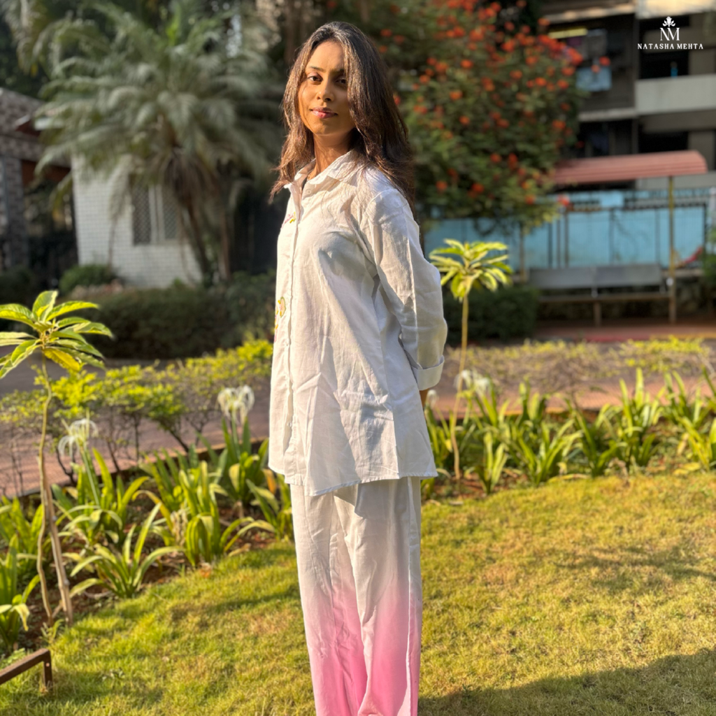 Elegant women's clothing set featuring a white shirt and pink ombre pants, perfect for casual outings in Dubai