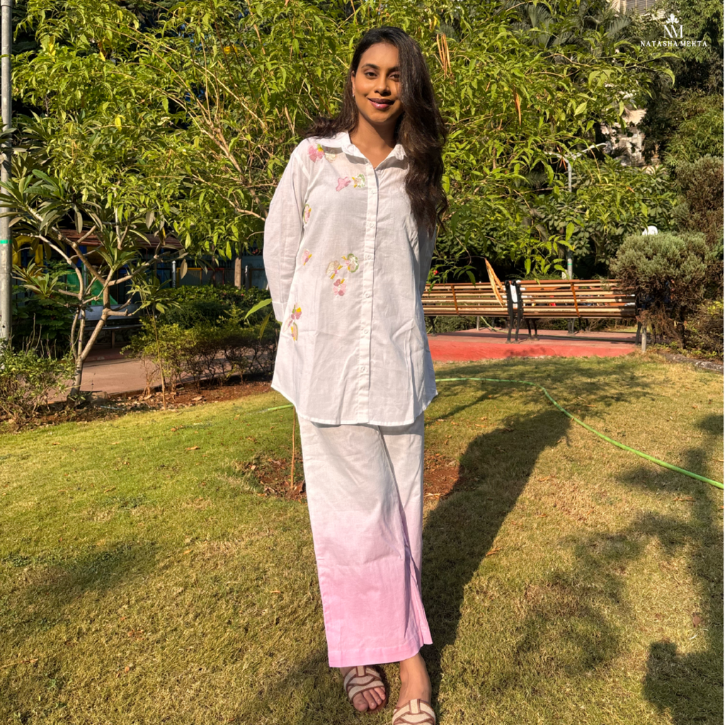 Women's clothing featuring a white shirt and pink ombre skirt, perfect for casual outings in Dubai