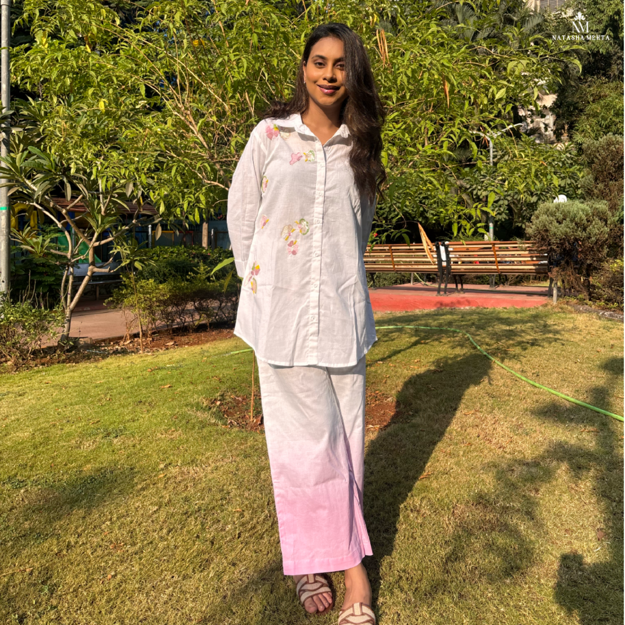 Women's clothing featuring a white shirt and pink ombre skirt, perfect for casual outings in Dubai