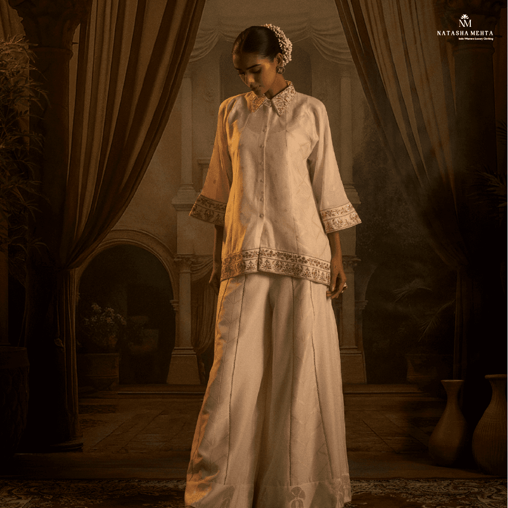 Elegant model wearing a luxury silk co ord outfit with intricate detailing and a stylish silhouette