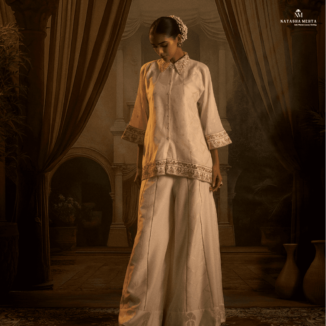 Elegant model wearing a luxury silk co ord outfit with intricate detailing and a stylish silhouette