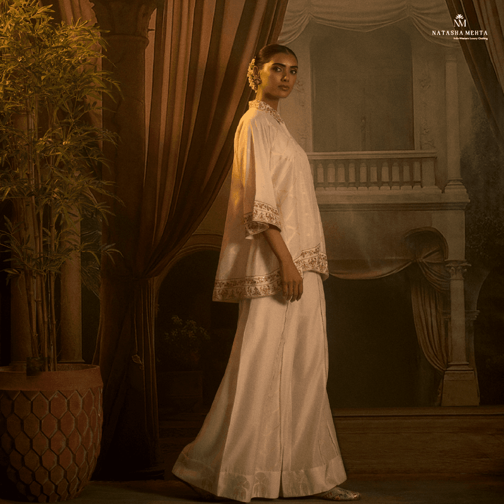 Elegant model showcasing a luxury silk co ord outfit with intricate detailing and a luxurious drape