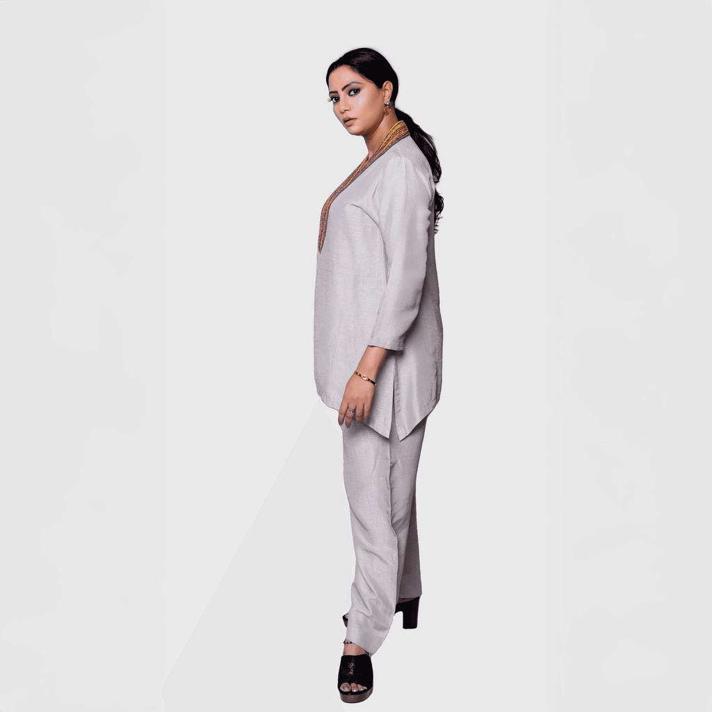 Elegant pearl white kurta set for women featuring a stylish design and comfortable fit