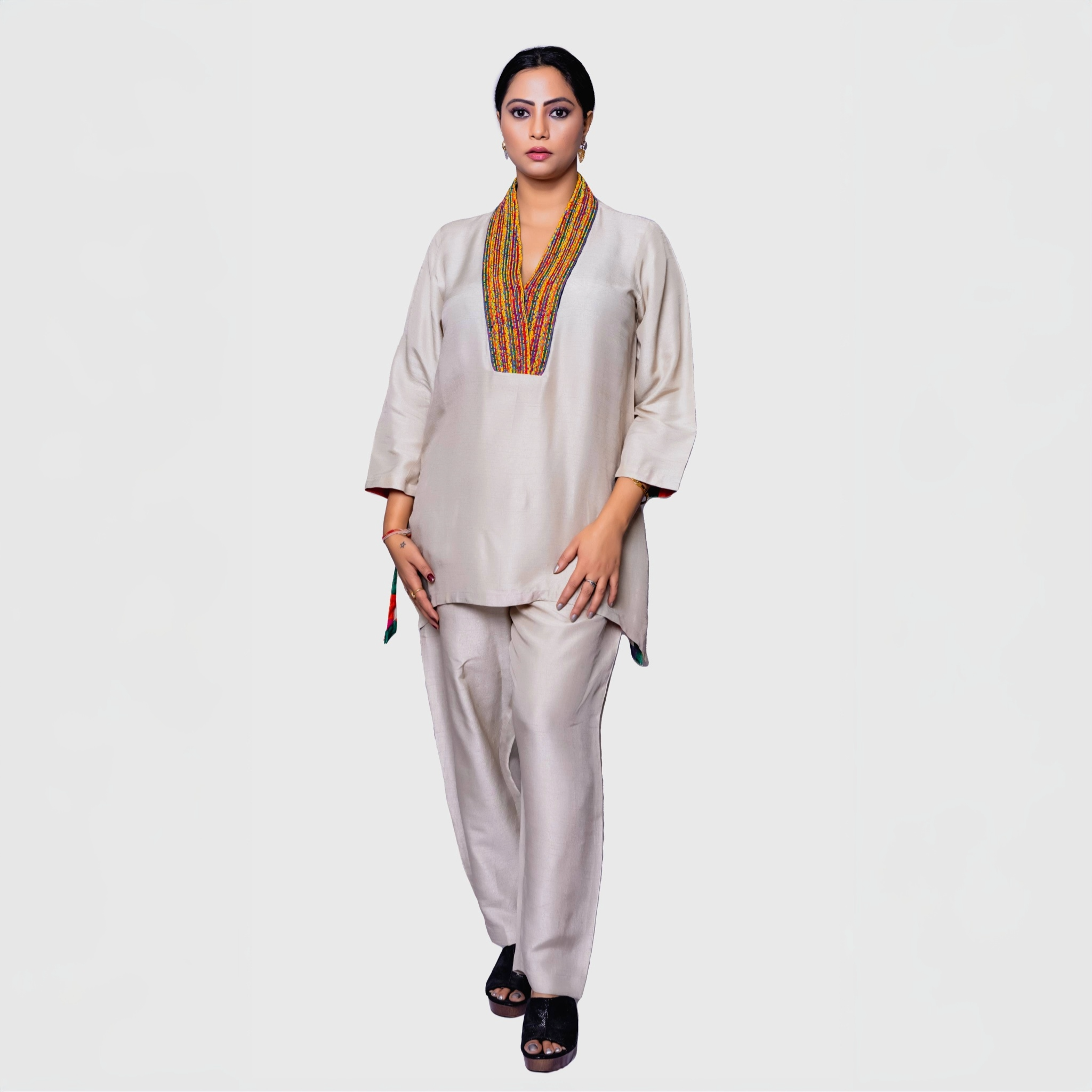 Pearl white kurta set with colorful yoke for women featuring a stylish design and comfortable fit
