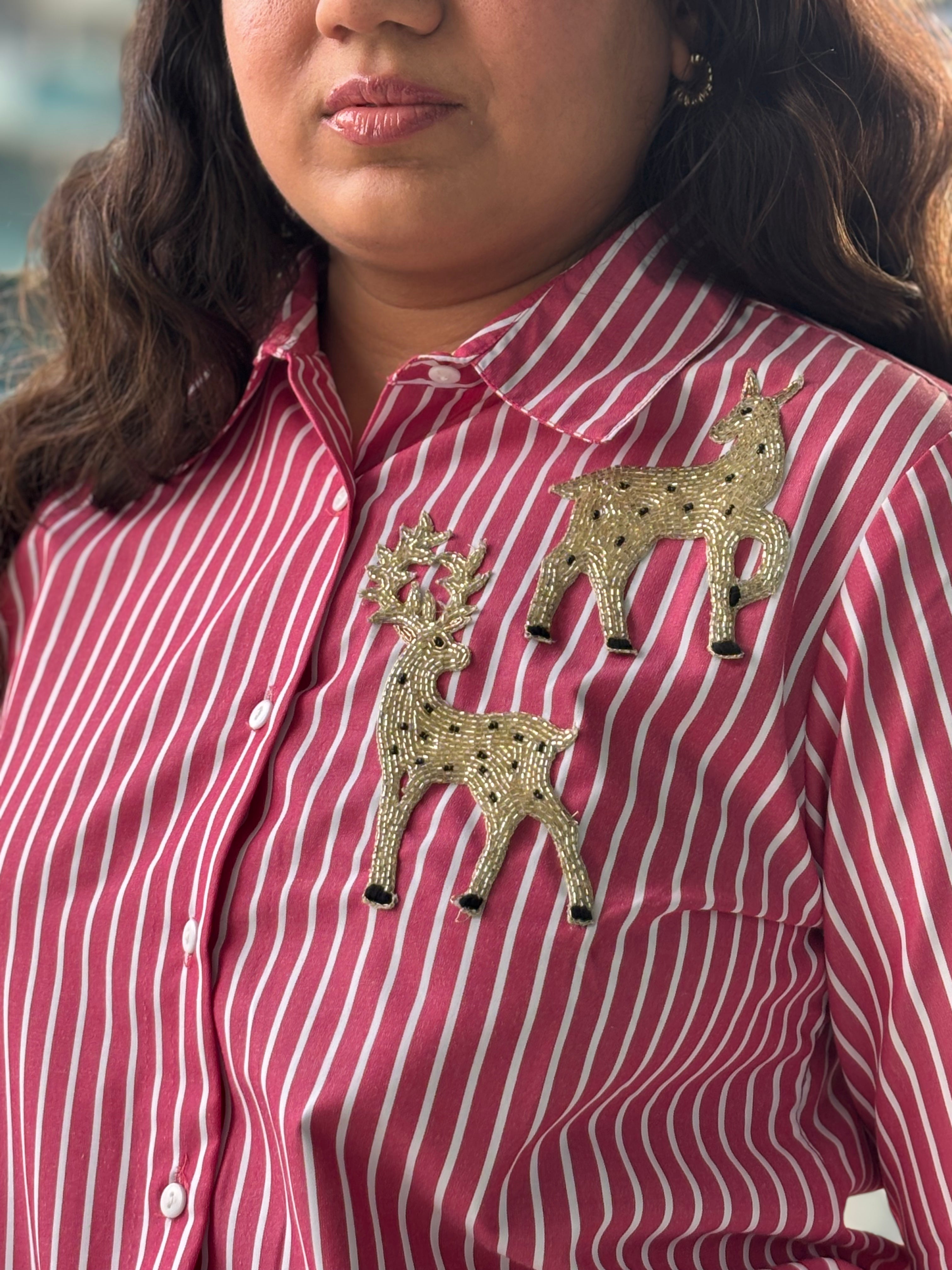 Stylish pink striped sequin top for parties featuring embellished deer designs