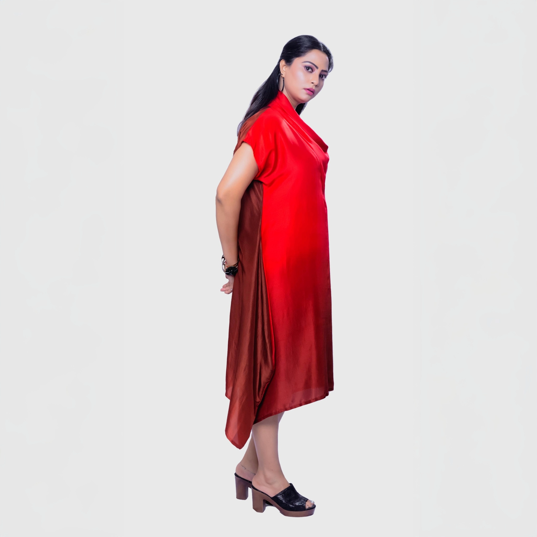 Stylish premium cocktail dress Dubai in vibrant red with a unique asymmetrical hemline