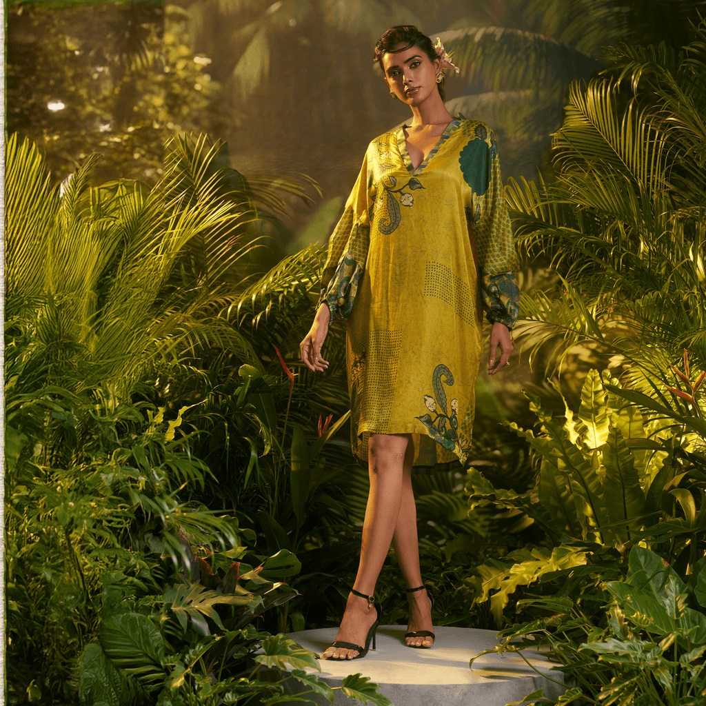 Elegant silk ajrakh kurta in vibrant yellow and green with intricate floral patterns, perfect for festive occasions