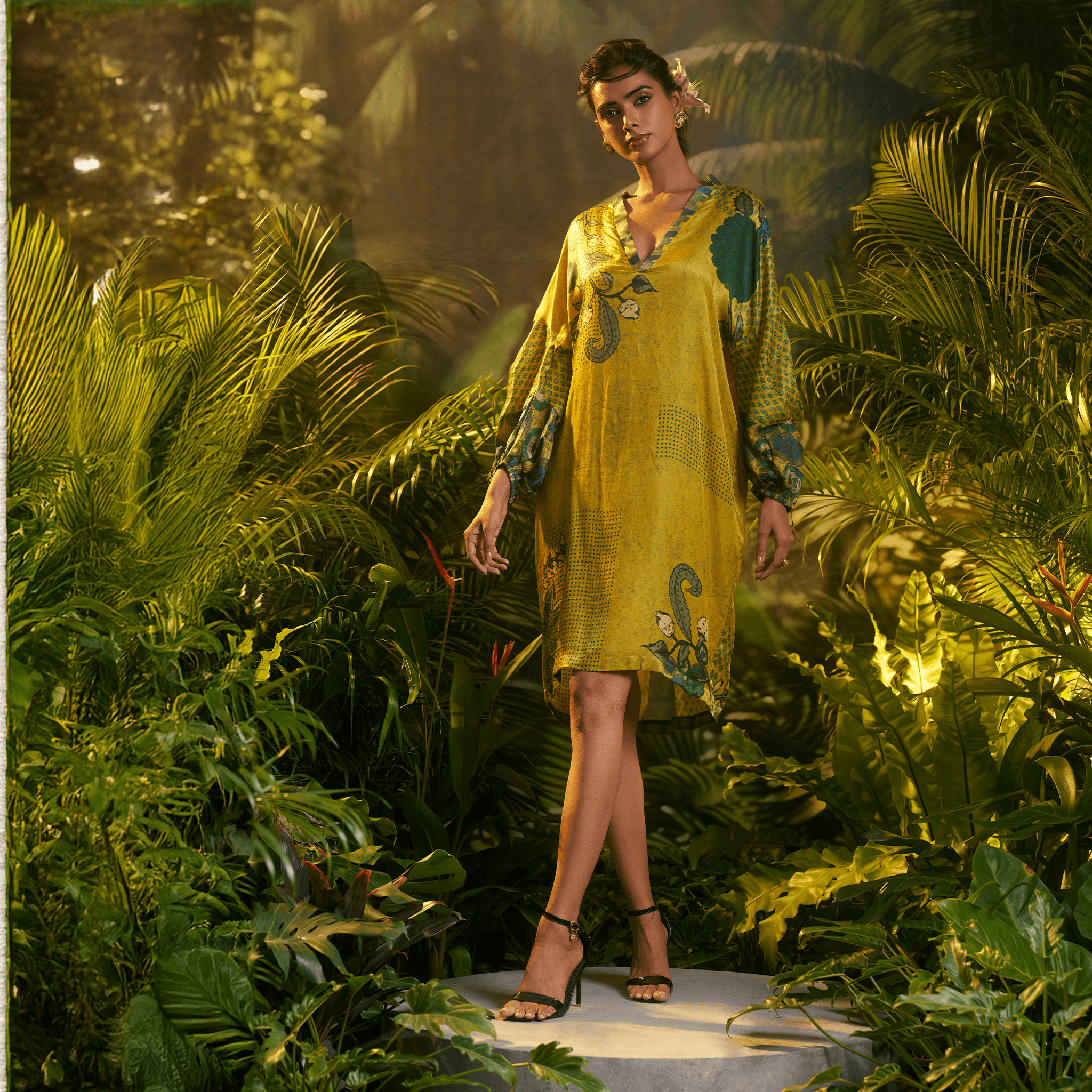 Elegant silk ajrakh kurta in vibrant yellow and green with intricate floral patterns, perfect for festive occasions