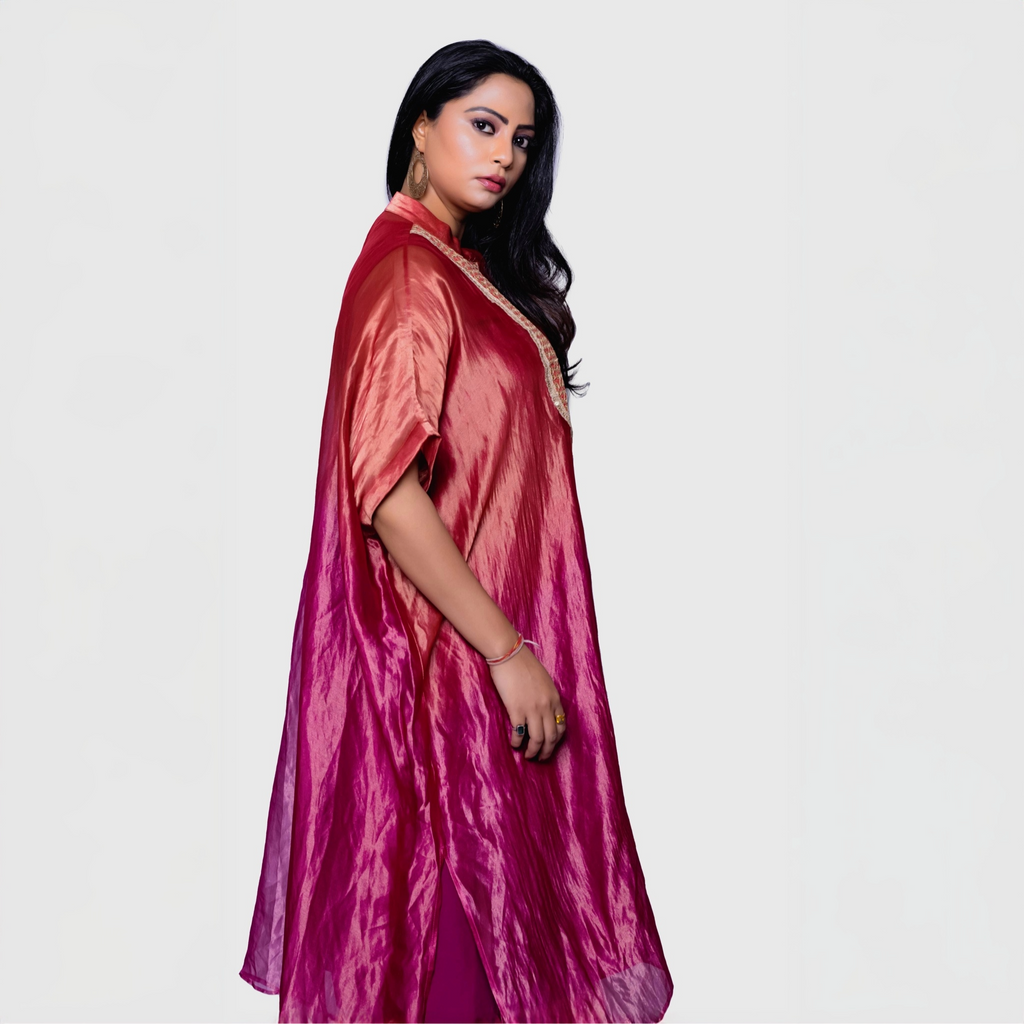 Elegant silk fusion evening gown in rich shades of red and pink for a sophisticated look