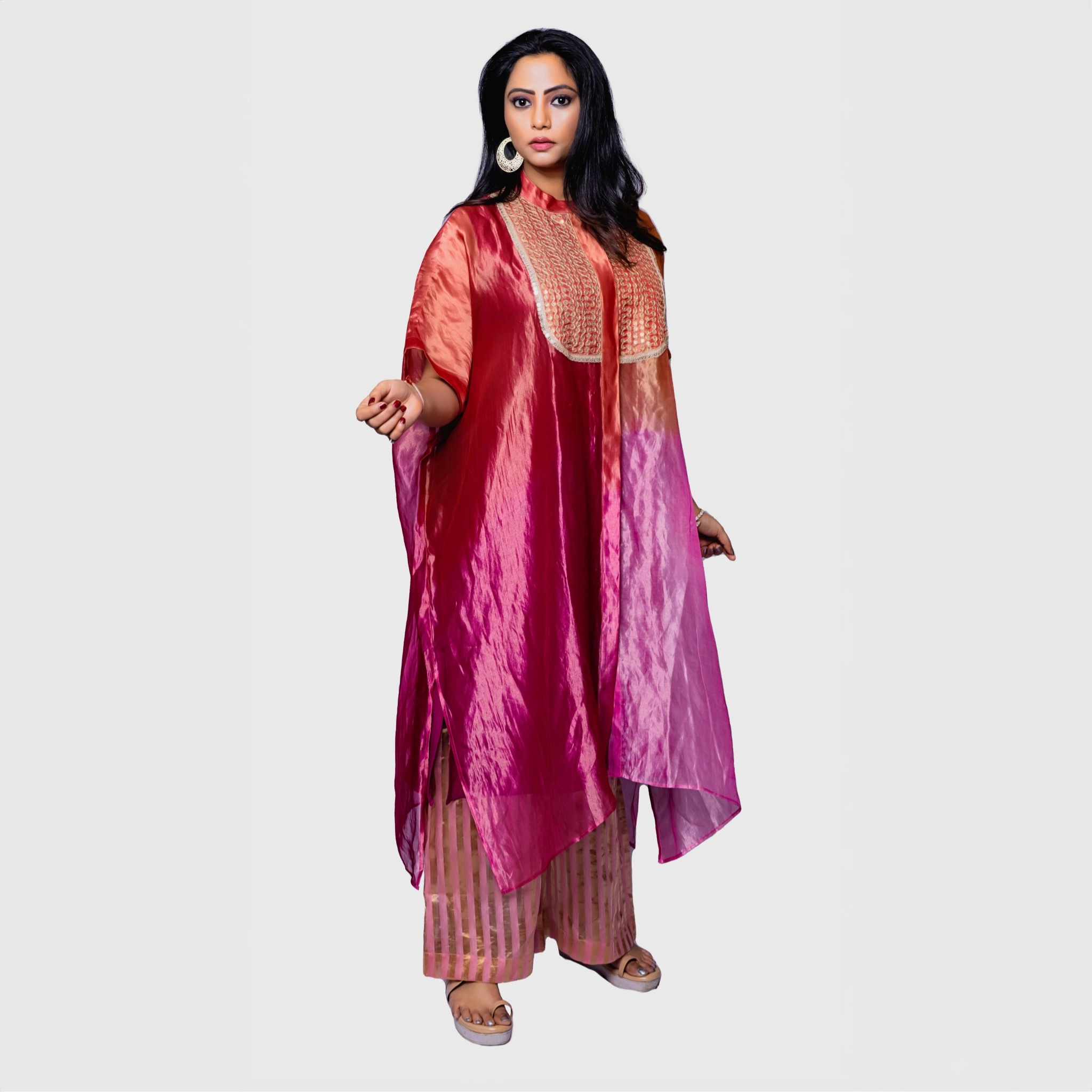 Silk fusion evening gown in vibrant colors featuring detailed embroidery for elegant occasions