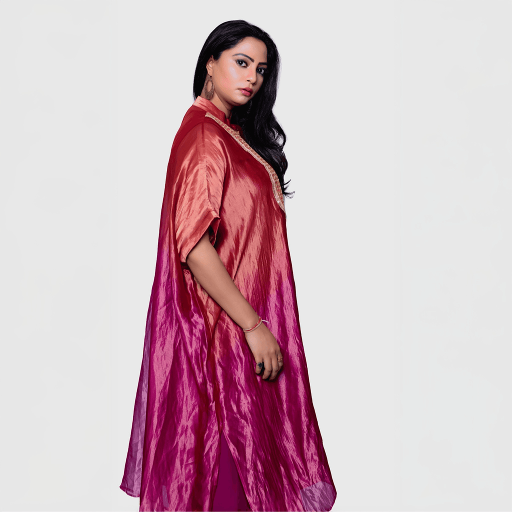 Elegant silk fusion evening gown in rich shades of red and pink for a sophisticated look