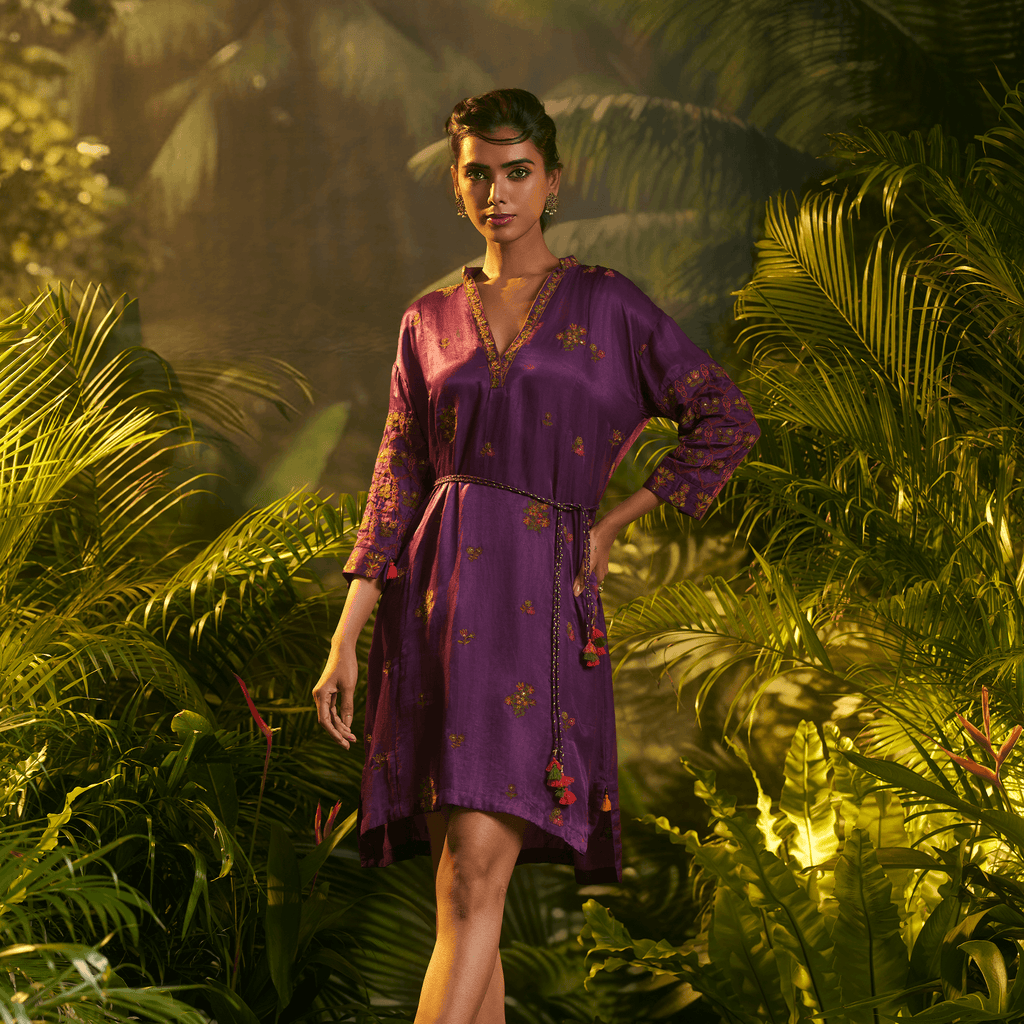 Elegant tropical designer dress Dubai with intricate floral patterns and a flattering tie waist