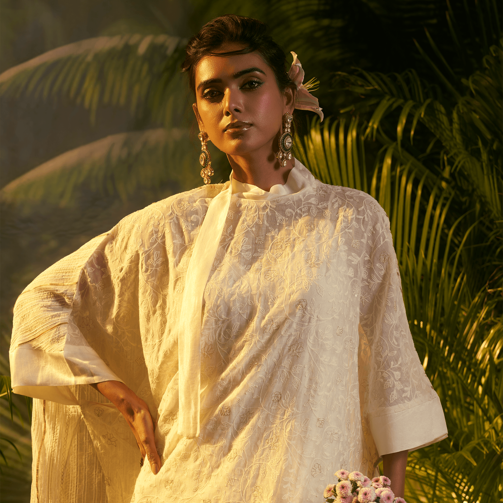 Elegant women's fusion fashion kaftan in white with intricate embroidery, perfect for special occasions in Dubai