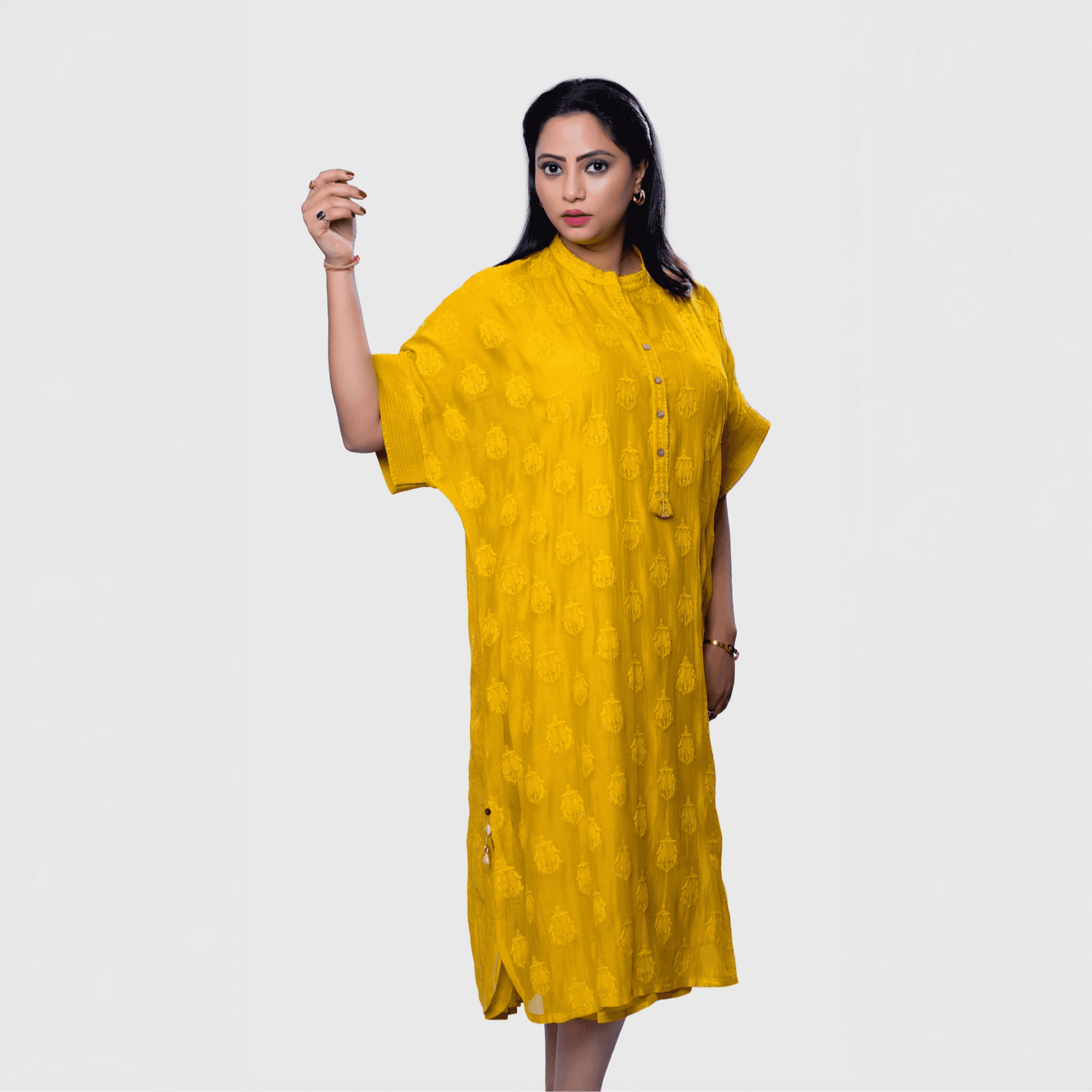 Stylish yellow fusion fashion kurta online featuring a relaxed fit and unique button details